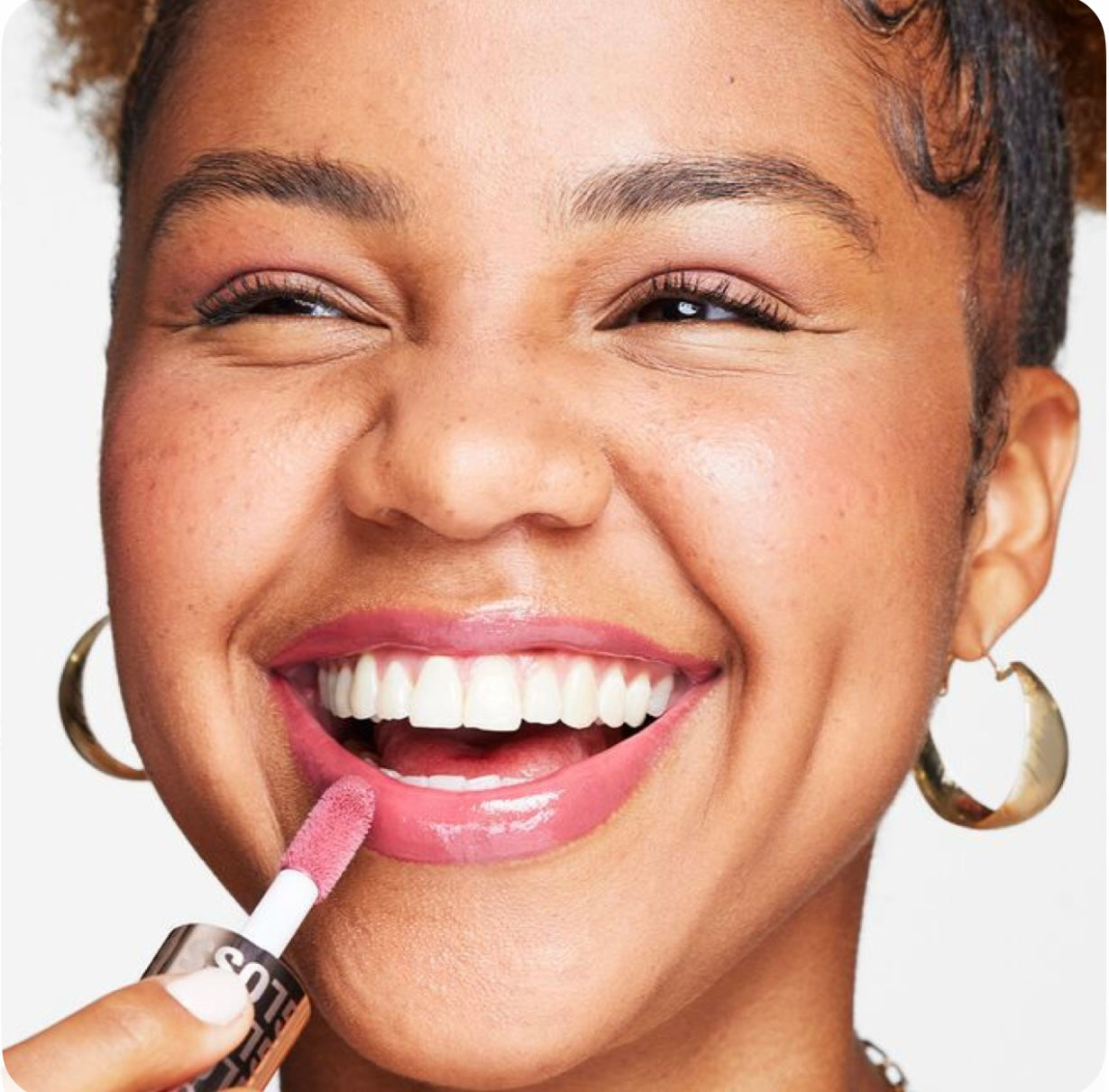 Revolution- POUT BOMB PLUMPING LIP GLOSS